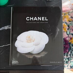 CHANEL Black Book with White Camellia Cover